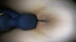 BDSM girl is sodomized with vibrator, big vaginal lips vibrating with pleasure