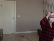 A mature BBW milf with big natural saggy tits changes into a nurse's costume. 2/16