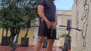 Real amateur Exhibitionist pissing in the street
