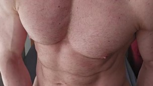 Tall muscular bi stud strokes his big uncut cock