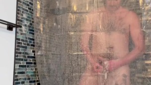 HAIRY UNCUT OTTER GETS SOAPY IN THE SHOWER