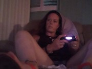 Busty Wife In Red Mini Dress Playing Video Games and Smoking Cigarettes 14/16