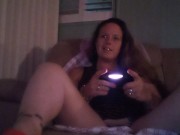 Busty Wife In Red Mini Dress Playing Video Games and Smoking Cigarettes