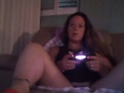 Busty Wife In Red Mini Dress Playing Video Games and Smoking Cigarettes 9/16