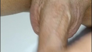 showing my big and veiny testicles closeup- young man