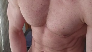 6'7" 250lb muscle God stroking his big uncut cock