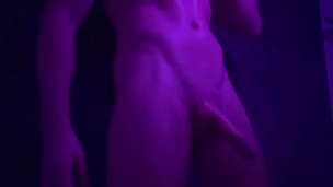 Muscular hot guy strokes his smooth body with cream and lets it drip from his big juicy cock.