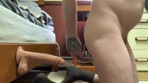 playing with my butt while caged