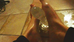 Ariel Ortiz gives a good footjob to her largest transparent dildo