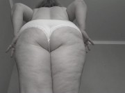 A mature fat milf with big natural saggy tits tries on panties. 10/16
