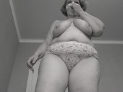 A mature fat milf with big natural saggy tits tries on panties. 6/16