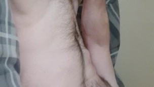 Teen wanks in bed watching porn and feeling dick over boxers