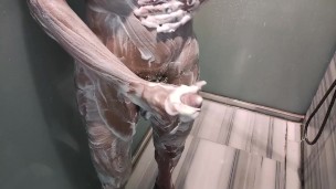 I fuck his mouth with my big cock in the shower at Rio and shoot it all over his face