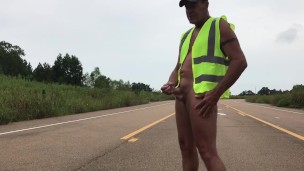 Construction worker in middle of road naked and jacking off. Eats own cum.