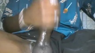 BLACK GAY BOY WITH MASSIVE COCK STROKING HARD