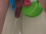 Guy pees in the bathroom rear view 10/16