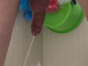 Guy pees in the bathroom rear view 2/16