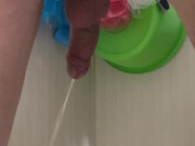 Guy pees in the bathroom rear view 3/16