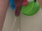 Guy pees in the bathroom rear view 4/16