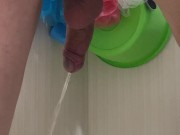 Guy pees in the bathroom rear view 6/16