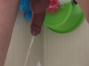 Guy pees in the bathroom rear view 7/16