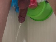 Guy pees in the bathroom rear view 8/16