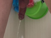 Guy pees in the bathroom rear view 9/16