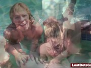 Four girls are enjoying stripping in the swimming pool, with one lucky guy joining them 10/16