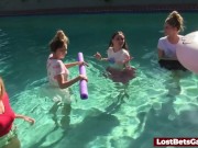 Four girls are enjoying stripping in the swimming pool, with one lucky guy joining them 5/16