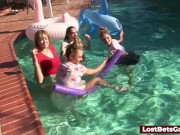 Four girls are enjoying stripping in the swimming pool, with one lucky guy joining them 7/16