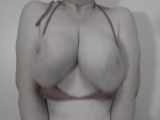 A mature milf shakes her big natural saggy tits. 11/16