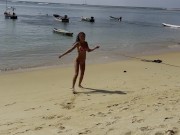 Monika Fox Poses In Pink Bikini With Stars On Beach 12/16