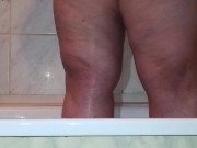 BBW MILF mom peeing in the shower in slow motion