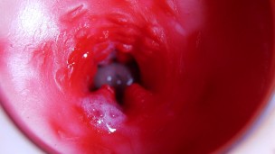 A huge cock inside a wet hole spews liquid and will soon fill with milk