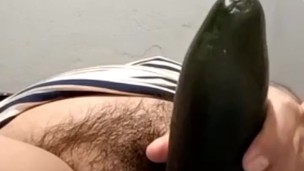 Girl with hairy pussy puts cucumber in the middle of a video call