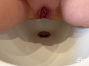 big open vagina pissing yellow urine in a bidet 1/16