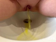 big open vagina pissing yellow urine in a bidet 3/16