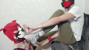 Puppy boy licks feet on top and sucks big dick