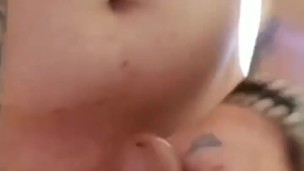 Masturbating