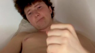 Cute curly twink cumming out of his huge pierced cock then showing off