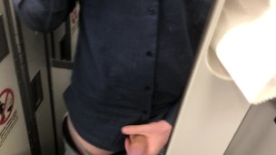 Big dick jerked off in airplane toilet