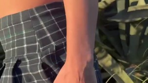 College Teen in Plaid Skirt Lifts It in Public and Shows She’s Not Wearing Panties – Just a Shiny Bu