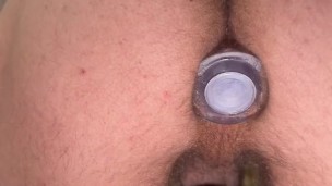 Teasing you in my grey sweatpants and chasity, showing off the feet and the tunnel in my hole