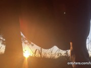 girl peeing with the sunset in the field 3/16