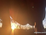girl peeing with the sunset in the field 6/16