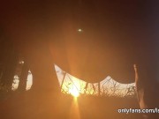 girl peeing with the sunset in the field 9/16