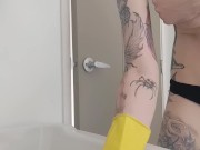 Cleaning house in rubber gloves 15/16