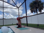 Sexy neighbor yoga instructor stretching by pool 3/16
