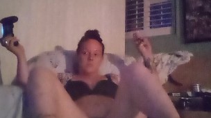 Gamer Girl In Black Bra and Panties Playing Video Games
