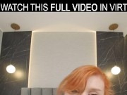 Hot redhead Lola Red plays with a huge dildo on the bed in VR. 2/16